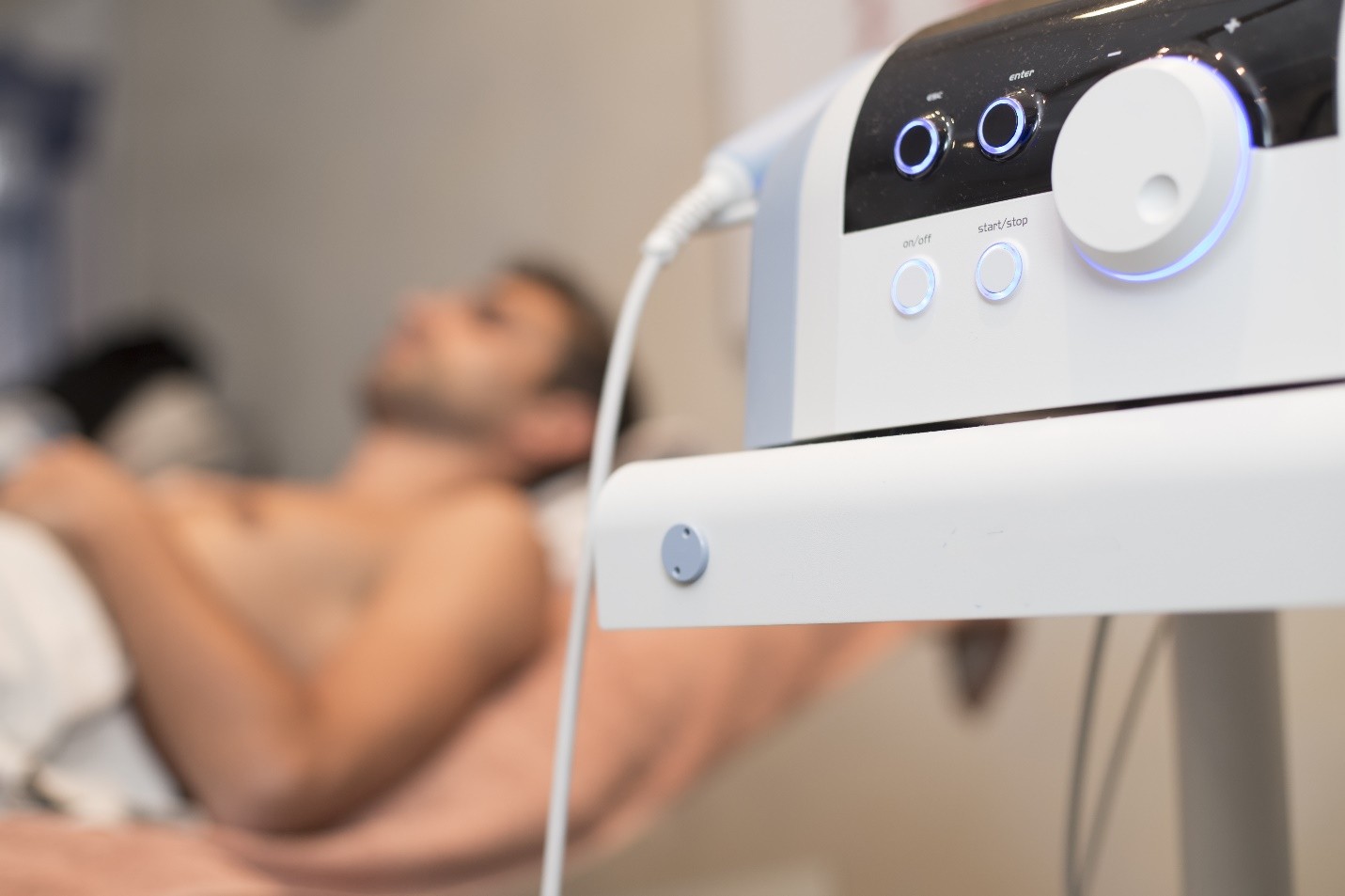 PEMFT medical device with a patient on a treatment bed
